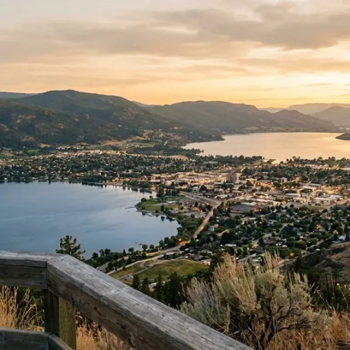 A tranquil sunset view overlooking the city of Penticton and its lakes, symbolizing the peaceful and grounded start to your healing journey with a Penticton therapist.